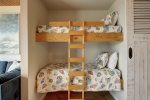Twin over twin bunk bed alcove with privacy door